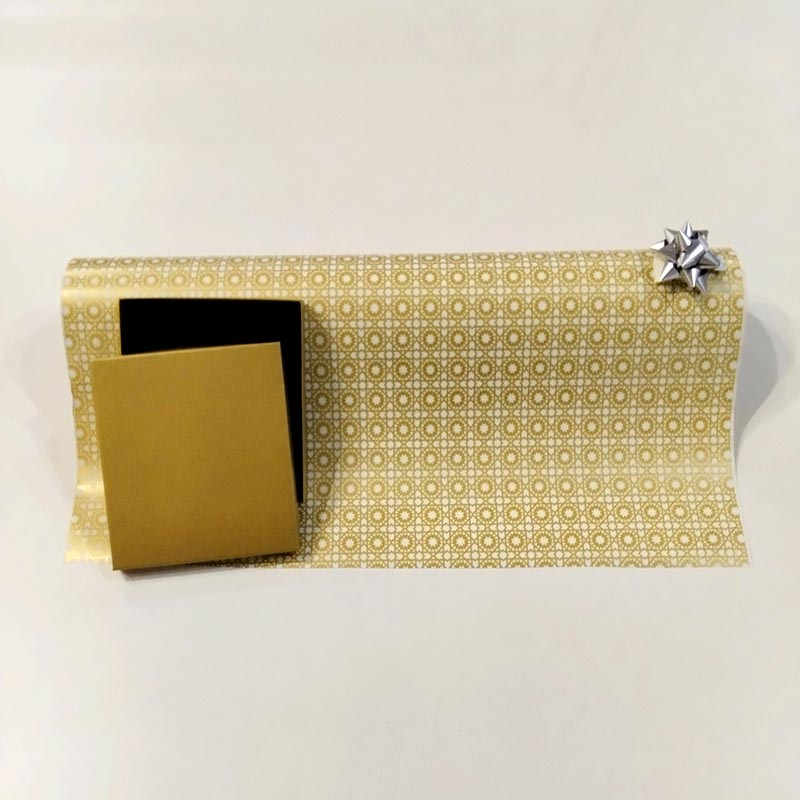 Papel de regalo impreso en oro 62 cm