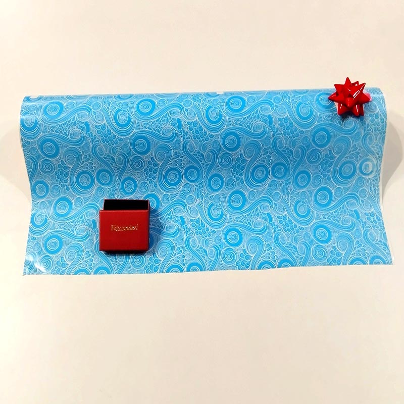 Papel de envoltura espiral azul 62 cm