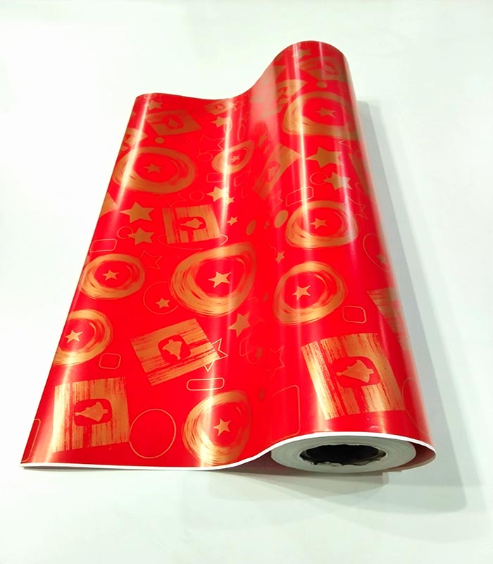 Papel de regalo rojo con patrones dorados 62 cm Navidad