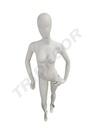 Female mannequin sitting in cream white