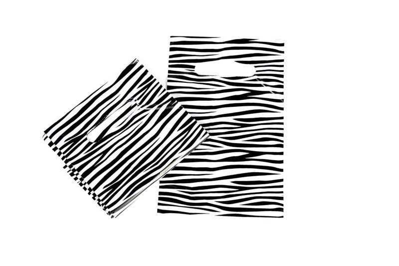 Plastic bag with die-cut handle and zebra print 35X45CM 100 units