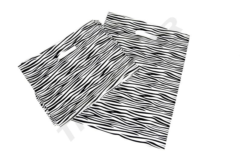 Saco de plástico com pega recortada e estampa de zebra 35X45CM 100 unidades