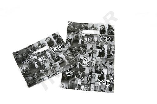 [010514] Plastic bags with die-cut handles 35X45 cm in black and white - 100 units